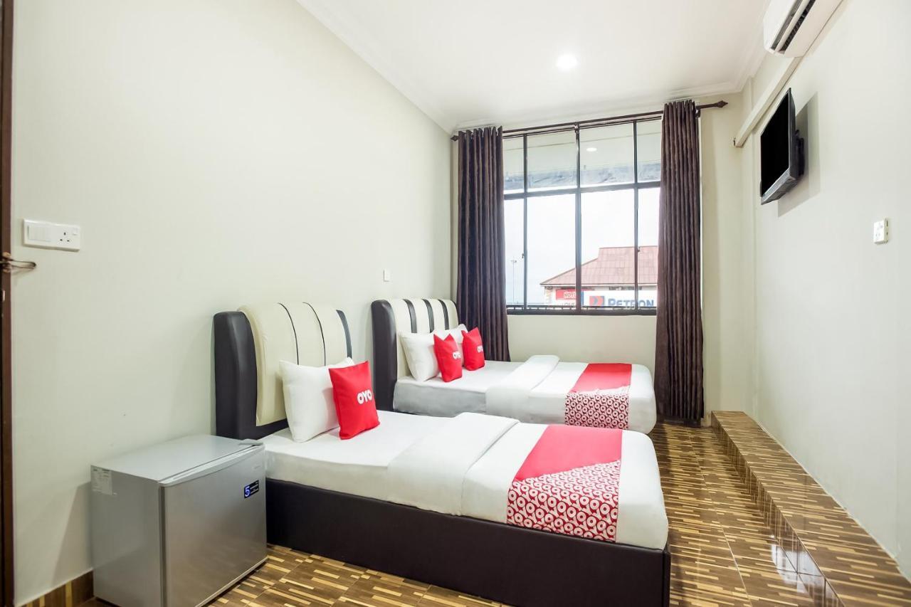 Oyo 89712 Grand Inn Semporna Cameră foto